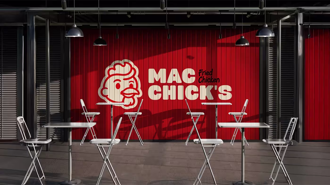 Mac Chick’s restaurant seating area with the logo on the feature wall